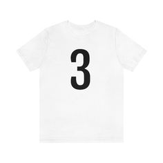 Explore Stylish Tee Shirts with Numbers Numerology Meets Fashion Explore our exclusive collection of tee shirts with numbers on them, perfect for those who appreciate fashion with a personal touch. Whether you’re searching for a t-shirt with a number or numbered t-shirts for men and women, our collection offers a variety of styles that cater to all tastes. From classic tee shirts and stylish tees to the essential tshirt and shirt options, there's something for everyone. Our collection also inclu Crew Neck Cotton T-shirt With Number Print, Cotton T-shirt With Number Print, Crew Neck, Cotton Crew Neck T-shirt With Number Print, Black Number Print Crew Neck T-shirt, Black Crew Neck T-shirt With Number Print, White Cotton T-shirt With Number Print, Black Graphic Tee With Number Print, Short Sleeve Cotton Shirt With Number Print, Cotton Short Sleeve Shirt With Number Print