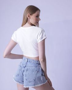 Exuding an air of sophistication, this slinky crop top is crafted from 97% cotton and 3% spandex with a medium stretch for a figure-flattering slim fit. With a round neck and short sleeves, it is further adorned with alluring tie front detailing. For best care, machine wash or take to a professional dry cleaner. Stretch Elastane Crop Top, Fitted Elastane Short Sleeve Crop Top, Fitted Casual Elastane Crop Top, Stretch Elastane Crop Top For Summer, Casual Fitted Elastane Crop Top, Fitted Elastane Casual Crop Top, Summer Stretch Elastane Crop Top, Basic Cropped Shirt For Summer, Trendy Summer Crop Top With Crew Neck