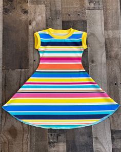 Summer Stripe Girl Dress Casual Summer Twirl Dress For Playwear, Striped Stretch Dresses For The Beach, Casual Short Sleeve Summer Twirl Dress, Beach Striped Stretch Dresses, Casual Beach Twirl Dress For Spring, Cute Summer Twirl Dress For Playwear, Casual Twirl Dress For Playtime, Playful Cotton Twirl Dress For Beach, Multicolor Short Sleeve Twirl Dress For Summer