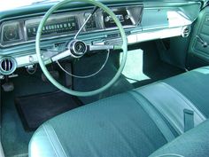 the interior of an old car is clean and ready to be used