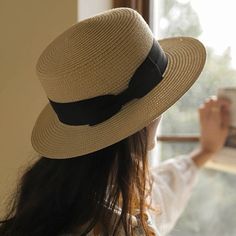 Stride under the sun with confidence! Our Boater Hat is not only stylish but provides a substantial shield from the harsh sun rays, boasting a UPF 50+ rating. The wide brim casts a comforting shade over your face, letting you revel in every outdoor soiree, beach outing, or casual day out in the city, without a worry. Outdoor Soiree, Straw Boater Hat, Leather Beret, Brown Bow, Beach Outing, Straw Boater, Knit Beret, Personalized Hats, Hat Beret