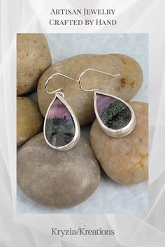 Picturesque scenes that look like dusk over a lush green forest valley landscape are portrayed in these one-of-a-kind purple moss agate earrings. Learn more about these sterling silver artisan-made earrings at www.KryziaKreationsStudio.com Forest Valley, Lush Green Forest, Valley Landscape, Agate Earrings, Artisan Earrings, Green Forest, Lush Green, Moss Agate, The Valley