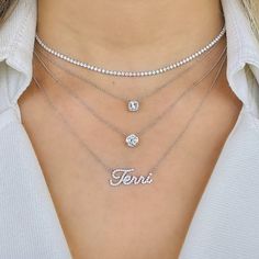 18k white gold floating necklace set with a 0.90 carat round diamond. Comes with an appraisal and a complimentary cleaning kit. Item Information Metal: 18k Gold Chain Length: 16"+1" Diamond Information Dimensions: 6.13x6.1mm Clarity (Minimum): SI1 Color (Minimum): H Carat Weight: 0.90 No. Of Stones: 1 Fine Jewelry Diamond Tennis Necklace As Gift, Fine Jewelry Diamond Tennis Necklace Gift, Diamond Tennis Necklace As Gift, Fine Jewelry Diamond White Tennis Necklace For Anniversary, Gift Tennis Necklace With Diamond Accents, Anniversary Brilliant Cut Tennis Necklace, 14k Gold Tennis Necklace With Diamond Accents, Fine Jewelry Solitaire Diamond, Diamond White Solitaire Necklace With Diamond Accents