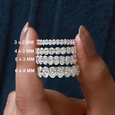 a person holding three pieces of diamond jewelry in their hand with measurements for each piece