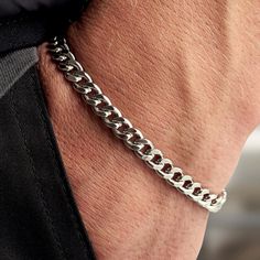 This alluring rhodium-plated sterling silver curb chain bracelet is given a refined touch with a gleaming rhodium plating that ensures longevity and a brilliant shine. Whether worn solo or stacked with other bracelets, this striking piece is a perfect style staple for the contemporary man. Curb Chain Bracelet, Curb Chain, Bracelet Sizes, Chain Bracelet, Rhodium Plated, Bones, Plating, Bracelet, Sterling Silver