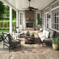 an outdoor living area with furniture and a fireplace