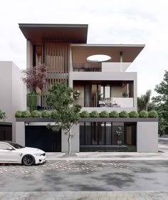 a white car parked in front of a tall building with trees on the side of it