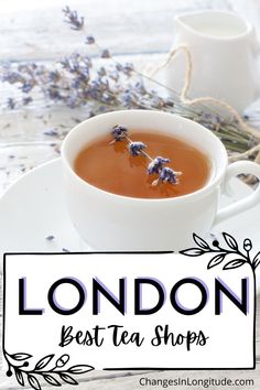 White teacup filled with tea and a spring of lavender, with lavender in background Tea In London, Drink Bucket, England Travel Guide, London Tea, Tea Shops, Travel England, Uk Trip, Wales Travel, Trip To London