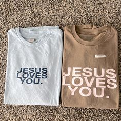 Bundle Of Two Jesus Loves You Company T-Shirts! Both Are Size Medium! Brown Is Brand New And The Blue Was Just Tried On But Never Worn. Retail At $38 Each And The Mocha/Blush Is Sold Out! Cricut Projects Clothes, Jesus Loves You Shirt, Jesus Tshirt Design, Mission Trip Shirts Design, Christian Tshirt Designs, Mission Trip Shirts, Jesus Merch, Jesus Clothing, Christian Outfits