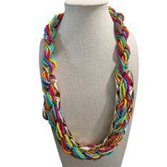 Double Strand Multi-Color Seed Bead And Metal Necklace -- 24". This necklace has a double strand made up of Six strands of glass beads: Orange, Blue, Red, Green, Pink, and Bronze. These strands are fed through an open gold-tone metal link, Measurements: Length: 24; Width: 1-1/2"; Extender: 3"0 Multicolor Multi-strand Beaded Necklaces For Beach, Multicolor Beads For Party Costume Jewelry, Multicolor Beads For Costume Jewelry Party, Multicolor Multi-strand Beach Beads, Multicolor Multi-strand Beads For Beach, Multicolor Glass Costume Jewelry Necklaces, Multicolor Glass Costume Jewelry Necklace, Multicolor Costume Jewelry Beads For Party, Multi-strand Necklaces With Faceted Beads For Beach