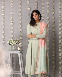 Description: Princess cut anarkali with anchor embroidered flowers all over. Accompanied by churidaar and ombre dupatta with lace all over borderColour Pista GreenFabric ChanderiCare Dry Clean onlyFit Tailored Anarkali Kurta In Pista Green With Dupatta, Anarkali Kurta With Dupatta In Pista Green, Pista Green Anarkali Kurta With Dupatta, Unstitched Pista Green Anarkali Set With Cutdana, Churidar With Sheer Dupatta In Traditional Drape, Churidar With Sheer Dupatta And Traditional Drape In Mulmul, Traditional Mulmul Churidar With Sheer Dupatta, Anarkali Pista Green Dupatta For Transitional Season, Pista Green Georgette Anarkali Set For Transitional Season