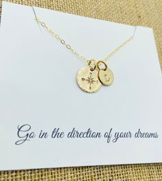 "Graduation Necklace Necklace is all 14k gold filled and customized with the letter of your choice. This is a hand stamped 14k gold filled compass necklace with a 1/2\" 18g 14k gold filled disc with a compass symbol with hammered edges  and an 8mm 14k gold filled disc with a stamped initial. Comes with a 18\" gold filled  cable chain. Please provide the following at checkout in message to seller box: -Initial you  want stamped Each letter has been individually hand stamped. Because of this, the lettering may have slight variations in the spacing, depth of the impression and the alignment. This is the nature of hand stamped jewelry and part of its charm. Back of disc can't be stamped. To check out more personalized items from our shop please click here https://www.etsy.com/shop/UniquelyImpr Gold Inspirational Hand Stamped Charm Necklace, Hand Stamped Gold Jewelry For Best Friend, Hand Stamped Gold Necklace For Best Friend, Adjustable Hand Stamped Gold Charm Necklaces, Inspirational Gold Hand Stamped Charm Necklace, Adjustable Gold Hand Stamped Charm Necklaces, Everyday Gold Jewelry With Compass Design, Compass Symbol, New Bern