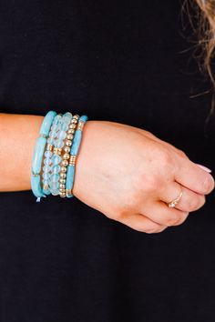 Elevate your style with this fabulous bracelet! This beautiful, beaded design in a lovely blue color can be worn as a set or individually, making it versatile and perfect for any outfit! Show your love and elevate your fashion sense at the same time! Blue Crystal Bracelet With Stackable Round Beads, Blue Stackable Jewelry With Round Beads, Trendy Turquoise Stackable Beaded Bracelets, Blue Stackable Stretch Bracelet, Trendy Blue Stackable Stretch Bracelet, Stackable Blue Stretch Bracelet, Blue Stackable Beaded Bracelets As Gift, Turquoise Stackable Beaded Bangle Bracelets, Turquoise Stackable Bangle Beaded Bracelets