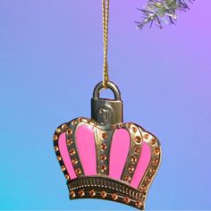 Live Like Royalty This Holiday Season With This Ornament From Juicy Couture Shaped Like A Crown. Framed By Shimmering Jewels With Pops Of Hot Pink. Available Exclusively At Urban Outfitters. Features - Crown-Shaped Ornament From Juicy Couture - Bedazzled Front For An Added Sparkle - Ready To Hang With Top Loop - Uo Exclusive Content + Care - 90% Zinc Alloy Casting, 5% Enamel, 5% Acrylic Rhinestones - Wipe Clean - Imported Size - Dimensions: 3"H New / Never Used Crown Ornament, Fruit Hearts, Cupcake Ornament, Princess Carriage, Christmas Light Ornament, Tiaras And Crowns, Ornament Set, Juicy Couture, Pink And Gold