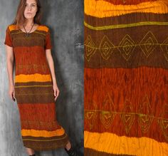 Vintage 90s brown, yellow tones tribal striped dress.  Maxi long bohemian stretchy summer dress.  Label: Indiska  Size: S  Fabric: viscose  Measurements:  Bust: 36" (90 cm) Waist: 31" (80 cm)  Hips: 36" (90 cm) Length: 50" (128 cm)  Sleeve: 20" (19 cm)  Shoulders: 17" (44 cm) Model's height 180 cm  Great condition If you want to purchase more items, write message. I will make special price and delivery. Fast courier delivery. Please, provide your mobile number in a note to seller. Vintage Brown Maxi Dress For Beach, Brown Fitted Bohemian Dress, Brown Fitted Bohemian Boho Dress, Fitted Brown Bohemian Dress, Fitted Brown Boho Dress, Brown Boho Maxi Dress In Hippie Style, Brown Boho Maxi Dress Hippie Style, Brown Fitted Hippie Dress, Brown Hippie Boho Maxi Dress