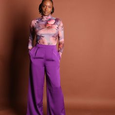 Elysia, a masterpiece of chic allure, unveils the epitome of modern femininity with our stretchable sheer long sleeve purple floral bodysuit featuring an elegant turtle neck. Elevate your style quotient with this sophisticated piece that seamlessly merges comfort with sensuality. The intricate purple floral pattern adds a touch of romance, while the stretchable fabric ensures a flawless fit, accentuating your curves. Versatile enough for day-to-night transitions, Elysia is your key to effortless Elegant Turtleneck Bodysuit For Parties, Feminine Long Sleeve Fitted Bodysuit, Feminine Fitted Long Sleeve Bodysuit, Fitted Long Sleeve Bodysuit With Floral Print, Chic Turtleneck Bodysuit For Party, Elegant Turtleneck Bodysuit For Workwear, Spring Evening Long Sleeve Bodysuit, Long Sleeve Bodysuit For Evening In Spring, Elegant High Neck Bodysuit For Work