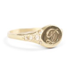 Viola's Treasure possesses the spirit of a well-worn pinkie ring, inherited by the favorite daughter of a dashing patriarch who once scaled Kilimanjaro and showed Hemingway the ways of Paris. Made to be handed down through the generations. Gorgeously hand-engraved with a single initial.�See Details for item specifics.Financing options available in partnership with�Affirm. Pinkie Ring, The Eldest Daughter, College Jewelry, Only Song, Pinky Rings, Eldest Daughter, Wedding Day Jewelry, English Alphabet, Favorite Daughter