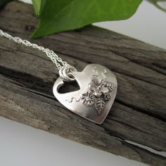 Handmade Fine Silver Heart Pendant with Flowers | Small Silver Heart Necklace | Heart Shaped Silver Flower Necklace | English Country Garden by FayeBenjamin on Etsy https://www.etsy.com/listing/484887449/handmade-fine-silver-heart-pendant-with Handmade Heart-shaped Jewelry For Weddings, Handmade Heart-shaped Wedding Jewelry, Handmade Heart Pendant Jewelry For Wedding, Delicate Silver Necklace For Anniversary Gift, Heart-shaped Flower Charm Jewelry For Anniversary, Heart Pendant Jewelry With Flower Charm For Anniversary, Sterling Silver Heart Pendant For Wedding, Anniversary Jewelry Heart Pendant With Flower Charm, Anniversary Heart Pendant Jewelry With Flower Charm