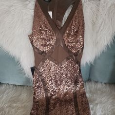 New With Tags,Brown Sequin Bebe Dress Just Never Got Around To Wearing It. Absolutely Beautiful. Originally 160.00. Brown V-neck Mini Dress For Party, Elegant Brown Bodycon Dress For Night Out, Glamorous Brown Party Dress, Elegant Brown Mini Dress For Party, Sleeveless Brown Bodycon Party Dress, Fitted Brown Mini Dress For Party, Brown Sequined Dress For Night Out, Elegant Brown Mini Dress For Night Out, Brown Cocktail Mini Dress