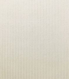 an upholstered white background with vertical stripes