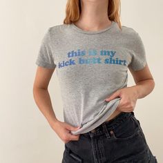 Graphic tee with sassy quote. Full length, but would make a cute baby tee if you wanted to crop it.  Pre-loved item. Good vintage condition. Brand: Nike Size on tag: Women's S. See measurements. Chest: 34" Length: 22.5" Shoulders: 14" Sleeves: 6" Please allow 0.5" margin of error for measurements, they are taken by hand. Model is 5'4" and usually wears a size small. Material: 90% cotton, 10% polyester. Wash: Machine wash cold. Tumble dry low. Made in: Mexico. Trendy Cotton T-shirt With Quote Print, Funny Quote Print Crew Neck Top, Cotton Slogan Cropped T-shirt With Crew Neck, Fitted Fun T-shirt With Slogan, Fun Fitted T-shirt With Slogan, Fun Fitted T-shirt With Text Print, Fitted Fun Slogan T-shirt, Short Sleeve Graphic Tee With Funny Print, Funny Cotton Tops With Quote Print