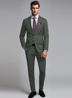 Seasonal colors are a great way to keep your tailoring interesting, so investing in our Huddersfield Stretch Autumn Green Wool Suit is a wise choice. Crafted from a wool blend, this suit ensures both style and comfort. The solid pattern and refreshing autumn green tone render it an excellent selection for leaving a lasting impression at the office, weddings, and other special occasions. 
 
Introducing "Voyager" collection, a truly exceptional fabric that combines luxury and performance. Crafted from super 100's australian merino wool fiber with touch of lycra for flexibility and resillience is enriched with prunelle weave that ensures a lively draping and crease resistance feature. 
  Look Includes     Huddersfield   Stretch   Autumn   Green   Wool  Fabric  Two Button Jacket Style  Notch L Green Wool Suit With Suit Collar, Wool Slim Fit Suits For Workwear, Fitted Wool Double Breasted Business Suit, Fitted Double Breasted Wool Business Suit, Slim Fit Wool Suits For Work, Wool Suits With Notch Lapel, Custom Fit Suit With Suit Collar For Work, Green Three-piece Business Suit, Tailored Professional Wool Suit And Tie Accessories