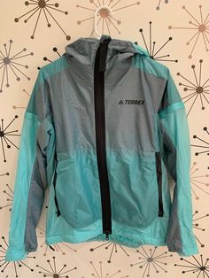 NWT ADIDAS TERREX MYSHELTER WINDWEAVE HOODED HIKING JACKET M $260 Mint GH7509. Check photos for detailed look.  No returns. Nylon Sportswear For Hiking, Nylon Sportswear Outerwear For Hiking, Technical Outdoor Windbreaker With Pockets, Technical Outdoor Windbreaker With Drawstring Hood, Sportswear Outerwear With Pockets For Hiking, Technical Windbreaker With Drawstring Hood For Outdoor Activities, Technical Windbreaker With Drawstring Hood For Outdoor, Adidas Spring Outdoor Outerwear, Adidas Outdoor Outerwear For Spring