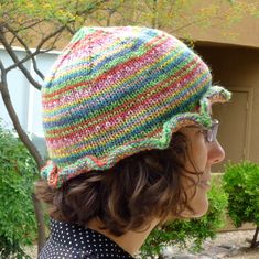 This hat is hand knitted with colorful wool/acrylic blend yarn in red, blue, pink, green, yellow, and teal. It has a cute ruffled brim all the way around.  The lightweight fabric is perfect for spring or summer! Hat measures approximately 7.25 inches tall and 22 inches around (unstretched). Fits most adult women. If this hat isn't perfect for you, not to worry! The haberdashery does custom orders. See our shop policies for more info. Cute Multicolor Hand Knitted Crochet Hat, Cute Multicolor Hand-knitted Crochet Hat, Knit Beret, Cable Knit Hat, Red And Teal, Women Pink, Hat For Women, Summer Hats, Red Lace