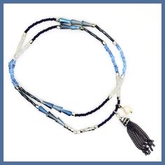 One long strand of colorful beads in shades of blue from navy to sky, plus milky-white round beads and metallic rondels line this stretchy strand that works as a wrap bracelet or a choker! About 18" long, stretches to fit most wrists, no clasp. from Kole Designs Adjustable Blue Single Strand Beaded Necklaces, Blue Beaded Stretch Bracelet, Blue Single Strand Heishi Bead Necklaces, Bohemian Blue Heishi Beads Stretch Bracelet, Adjustable Blue Beaded Stretch Bracelet, Blue Single Strand Heishi Beaded Necklaces, Blue Single Strand Bracelet With Round Beads, Adjustable Blue Stretch Bracelet With Spacer Beads, Blue Single Strand Bracelets With Round Beads