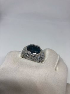 Huge great color blue topaz stone with small blue topazsurrounding nice setting is handcrafted in 925 sterling silver Can be sized, my jeweler charges $10. All rings are shipped in a nice gift box. Check out our over a THOUSAND great reviews Engraving is $4 per letter and is not always perfect depending on the piece. It can take a few days if the jeweler is busy. This is payable to Paypal Judithsltd@gmail.com Elegant Blue Topaz Ring With Stones, Blue Hallmarked Emerald Ring For Anniversary, Formal Sapphire Topaz Ring With Diamond Accents, Sapphire Rings With Diamond Accents And Blue Topaz, Formal Diamond Crystal Ring With Stones, Formal Crystal Diamond Ring With Stones, Blue Topaz Round Ring, Blue Topaz Ring With Stone Setting, Fine Jewelry Oval Topaz Ring With Stone Setting