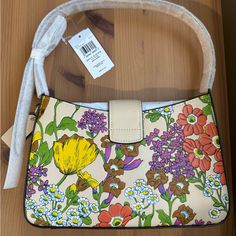 Style Number Cr161 Measurements Length: 9.75" Height: 6.5" Width: 2.5" Materials Refined Calf Leather Handle Adjustable Handle With 9.25" Drop Features Inside Zip Pocket Two Credit Card Slots Snap Closure Packaging May Slightly Vary Coach Multicolor Shoulder Bag With Detachable Handle, Daily Use Floral Print Shoulder Bag With Double Handle, Coach Multicolor Bag With Handles, Pink Coach Shoulder Bag With Gold-tone Hardware, Multicolor Floral Print Rectangular Shoulder Bag, Bags Coach, Coach Bags, Leather Handle, Snap Closure