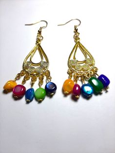 Fun, beautiful multicolor bead chandelier earrings.  Easy for casual events or dress-up events. Can be for Spring, Summer looks, or Fall, Winter looks. Multicolor Dangle Earrings For Celebration, Handmade Multicolor Teardrop Earrings For Parties, Beaded Chandelier Dangle Earrings For Celebration, Multicolor Beaded Dangle Chandelier Earrings, Beaded Chandelier Earrings For Celebrations, Colorful Dangle Beaded Earrings For Celebrations, Colorful Beaded Dangle Earrings For Celebrations, Celebration Beaded Chandelier Dangle Earrings, Multicolor Drop Chandelier Earrings For Celebration