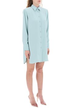 MVP Wardrobe mini shirt dress crafted in technical cady. Design with padded shoulders and back yoke with side pleats featuring pointed collar, front button fastening, long sleeves with double-button cuffs and rounded slits on sides. Relaxed fit with straight cut. The model is 177 cm tall and wears size IT 38. Size Info IT Color Detail Light blue Made In Italy Material 100%PL Season One spring Season Two summer Product clothing Brand MVP Wardrobe Size And Fit Latest Fashion Design, Cape Coat, Dress Crafts, Mini Shirt Dress, Pant Shirt, Skirt Suit, Straight Cut, Jeans Dress, Dresses For Sale