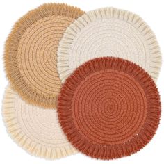 three round rugs with different colors and sizes