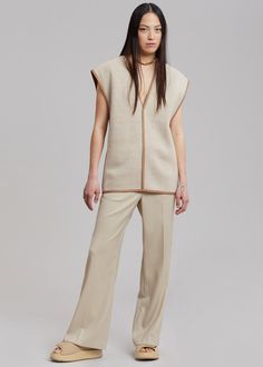 By Malene Birger Stephanie Vest - Bamboo Vest By Malene Birger Beige Stretch Knit Top For Work, Fitted Wool Top In Beige, Fitted Wool Beige Top, Fitted Beige Wool Top, Chic Sleeveless Wool Top, Chic Wool Sweater Vest For Work, Neutral Knit Tops For Workwear, Fitted Beige Sweater Vest For Work, Lightweight Wool Beige Top For Spring