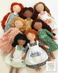 a group of dolls sitting next to each other