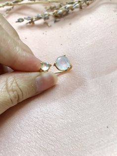 "Round Rainbow Moonstone adjustable ring. They are finely-detailed, high-quality, and very precious. They come with genuine round rainbow moonstones in prong set in 18k Gold over Sterling Silver and Rose Gold Over Sterling Silver. Size of moonstone: the larger stone is 9 mm and the smaller stone is 6 mm in diameter. Also available in Rose Gold over Sterling Silver and 18k Gold over Sterling Silver. Our rainbow moonstone features occasional iridescent or multicolored (especially blue) flashes wit Adjustable Moonstone Open Ring Birthstone, Adjustable Open Moonstone Birthstone Ring, Adjustable Moonstone Crystal Ring With Open Design, Moonstone Open Ring With Moon Phase For Gift, Adjustable Moonstone Crystal Ring With Birthstone, Minimalist Moonstone Crystal Open Ring, Adjustable Gold Crystal Ring For Proposal, Dainty Moonstone Open Ring Gift, Dainty Open Moonstone Ring For Gift