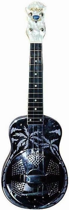 a black and white photo of a guitar with a diamond head on it's neck