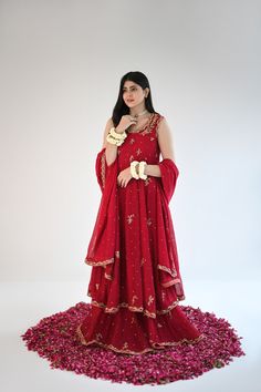 Designed on a beautiful tone of maroon in handloom cotton net, this panelled kalidaar features gold ada work of dabka naqshi, sequins and nug. An alluring three piece is paired with a heavily embellished dupatta and flappers. The length of the kalidaar is 46 inches. Order Duration: 4 to 6 weeks Boutique Dress Designs, Boutique Dress, Three Piece, Dress Designs, Designer Dresses, Boutique, Gold, Design