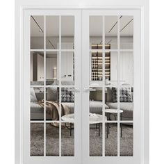 an open sliding glass door in front of a living room