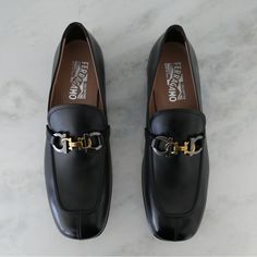 Salvatore Ferragamo Black Leather Loafers With Leather Sole Cancio Bit In Silver And Gold Colors Size 9 Ee New With Tags / Never Worn Ferragamo Box Included Bought At Bal Harbour Shops Luxury Black Loafers With Brogue Detailing, Black Luxury Wingtip Loafers, Luxury Black Wingtip Loafers, Luxury Black Loafers With Leather Lining, Timeless Black Loafers For Work, Timeless Black Loafers For Workwear, Luxury Black Loafers For Semi-formal Occasions, Timeless Black Calf Leather Loafers, Black Calf Leather Loafers With Leather Sole