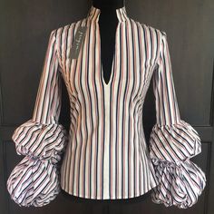 New With Tags This Is Such A Fun Top! Red White & Blue Striped With A V Neckline & Puffed Sleeves. Pair This Up With A Pair Of Skinny Jeans& Red Heels You Will Be Ready For A Night Out On The Town. Has A Side Zipper (Shown In Pics) Pit To Pit 17” Shoulder To Hem 24” Sleeves 24-26” Try My Bundle Discount & Save!! 3 Or More Items 10% Off No Lowballers Plz Trendy Fitted Striped Blouse, Blue Fitted Blouse With Balloon Sleeves, Spring Party Striped Blouse, Striped Long Sleeve Party Top, Blue Fitted Top With Balloon Sleeves, Fitted Striped Blouse With Ruffles, Striped Long Sleeve Party Blouse, Trendy Striped Puff Sleeve Top, Striped Tops For Fall Party