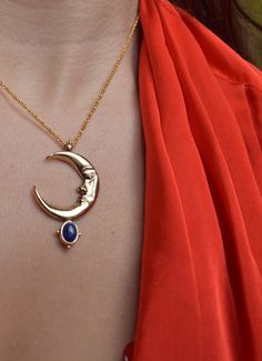 In the Ancient mythology Zirna was an Etruscan goddess of the waxing moon. The moon is the symbol of the soul, the closet celestial body of the planet Earth. This is a sculptural pendant, carved in wax, casted in Bronze, set with a beautiful Lapis Lazuli gemstone & polished to a beautiful burnished gold finish. It is harmonized with a long bronze cable chain. Circumference is 42 cm. Looks great layered on it's own but do not hesitate to pair it with other chain necklaces for a truly unique look Celestial Style Necklace With Moon Charm, Celestial Moon-shaped Jewelry For Meditation, Celestial Moon Jewelry For Meditation, Moon Shaped Necklace With Large Pendant, Celestial Crescent Jewelry For Meditation, Spiritual Moon Charm Pendant Jewelry, Celestial Pendant Jewelry For Meditation, Celestial Moon Phase Pendant Necklace, Spiritual Moon Jewelry With Sun And Moon Design