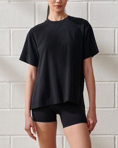 Our easy-fitting short-sleeve active tee in our active drapey cotton-blend fabric and legging-friendly length, with crew neckline and straight hem. Perfect to layer over our slim tanks! Athleisure Short Sleeve Crew Neck Top For Workout, Black Short Sleeve Activewear For Summer, Sporty Go-dry Short Sleeve Tops, Sporty Boxy Fit Tops For Sports, Sporty Relaxed Fit Crew Neck Short Sleeve Top, Fitted Short Sleeve Activewear For Everyday, Basic Short Sleeve Moisture-wicking Tops, Athleisure Boxy Fit Tops For Sports, Boxy Fit Athleisure Tops For Workout