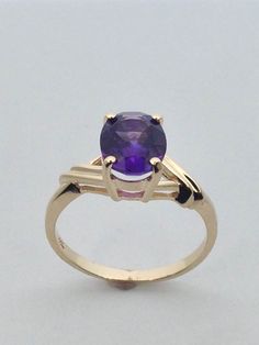 Solid 14kt Yellow Gold Ring Natural Amethyst is 9x7 mm Oval Shape Natural Amethyst is 1.40 Tcw Ring Size is  6.75 WITH GIFT BOX Natural Opal Ring, Baby Rings, Amethyst Gem, Yellow Gold Ring, Natural Opal, Amethyst Ring, Ring Ring, Elegant Jewelry, White Topaz