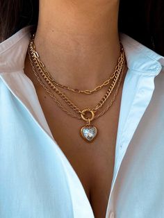 Dive into the chic vibe with our gold layered necklaces - whether you're going solo for a personalized touch or mixing it up with a combo, it's all about your unique style. Take your pick from the drop-down menu and slide into our DMs for any questions or special requests. Your style, your rules - let's elevate it together! Luxury Heart-shaped Necklace With Delicate Chain, Gold Plated Clavicle Chain Jewelry For Valentine's Day, Gold Plated Clavicle Chain For Valentine's Day, Luxury Gold Plated Heart Jewelry, Luxury Gold Plated Heart-shaped Jewelry, Gold Plated Chain Necklace For Valentine's Day, Luxury Heart-shaped Gold Plated Jewelry, Valentine's Day Gold Plated Clavicle Chain Jewelry, Valentine's Day Gold Plated Chain Necklace