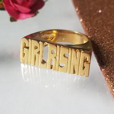 Modern Block letter name ring in 14k solid gold is a perfect statement ring for you or gift for your loved one, Best friend and so many other gift possibilities. Yes Modern block letter ring is Unisex. Sample of words: SEPARATE HANDS OR ONE FINGER 1.LOVE YOU. 2.PEACE LOVE 3.MEN NAME 3.YOUR NAME and many more....( contact me for more info) *COLOR* White gold 14k. Yellow gold 14k. Pink gold 14k. *SIZES* NAME 3/4'' to 1 '' depends on the name it is going to be adjusted accordingly by the ring size. Custom Name Nameplate Ring For Promise, Custom Nameplate Rings For Promise, Promise Ring With Custom Nameplate, Custom Nameplate Ring For Promise, Custom Name Plate Ring For Promise, 14k Gold Initial Ring For Promise With Custom Name, Custom Name 14k Gold Ring For Gift, Custom Name 14k Gold Ring As Gift, Custom Name 14k Gold Ring Gift