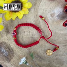 "Beautiful Children's Mexican Handmade Woven \" Red Evil Eye Symbol\" Unisex bracelet \"Mal de Ojo\" with the company of San Benito Symbol is Handmade braided Design by our Artisan Team to create a beautiful Stylish ,protection and positive accessory , definitely a must have in your religios Collection :) ( One bracelet per order) Color can change slightly depending on the device screen thats been viewed on. Bracelet has and adjustable : One size Fits All Unisex Brazalete Pulcera Tejida a Mano p Traditional Red Handmade Friendship Bracelets, Traditional Red Braided Bracelets As Gift, Traditional Red Friendship Bracelets For Beach, Traditional Red Braided Bracelets For Gift, Red Jewelry With Adjustable Length And Round Beads, Red Macrame Beaded Bracelets For Friendship, Handmade Red Braided Bracelets For Festival, Handmade Red Bracelets For Festival, Traditional Red Adjustable Friendship Bracelets