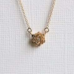 "Feminine and elegant, this necklace is for anyone who loves roses or any flowers. A delicate and beautiful rose pendant set with a sparkly diamond in the center hangs from an adjustable 16-18\" 1 mm cable chain.  It is also the perfect match to our ROSE ring available here >> https://etsy.me/35JCoHk ❁❁ I T E M ∙ D E T A I L S ❁❁ ✦Stone： Natural Diamond Shape： Round Size: 1 mm x 1 Quality: VS, F-G ✦ Pendant: Metal Type: Choice of solid 14K Gold with 20 gauge jump ring Metal Color: Rose / White / Luxury Rose Gold Necklace With Flower Charm, Round Gold Necklace, Fantasy Things, Bangles Design, Necklace Flower, Rose Pendant, Rose Ring, Rose Necklace, Necklace Rose