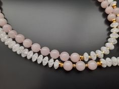 Elegant Handmade Double Strand Crystal Necklaces, Elegant Handmade Double Strand Crystal Necklace, Spiritual Gemstone Beads Jewelry For Valentine's Day, Elegant Rose Quartz Jewelry With Natural Stones, Valentine's Day Rose Quartz Beaded Jewelry, Rose Quartz Round Beads Jewelry For Valentine's Day, Pink Double Strand Necklace For Gift, Valentine's Day Elegant Beaded Necklaces, Elegant Rose Quartz Round Crystal Necklace